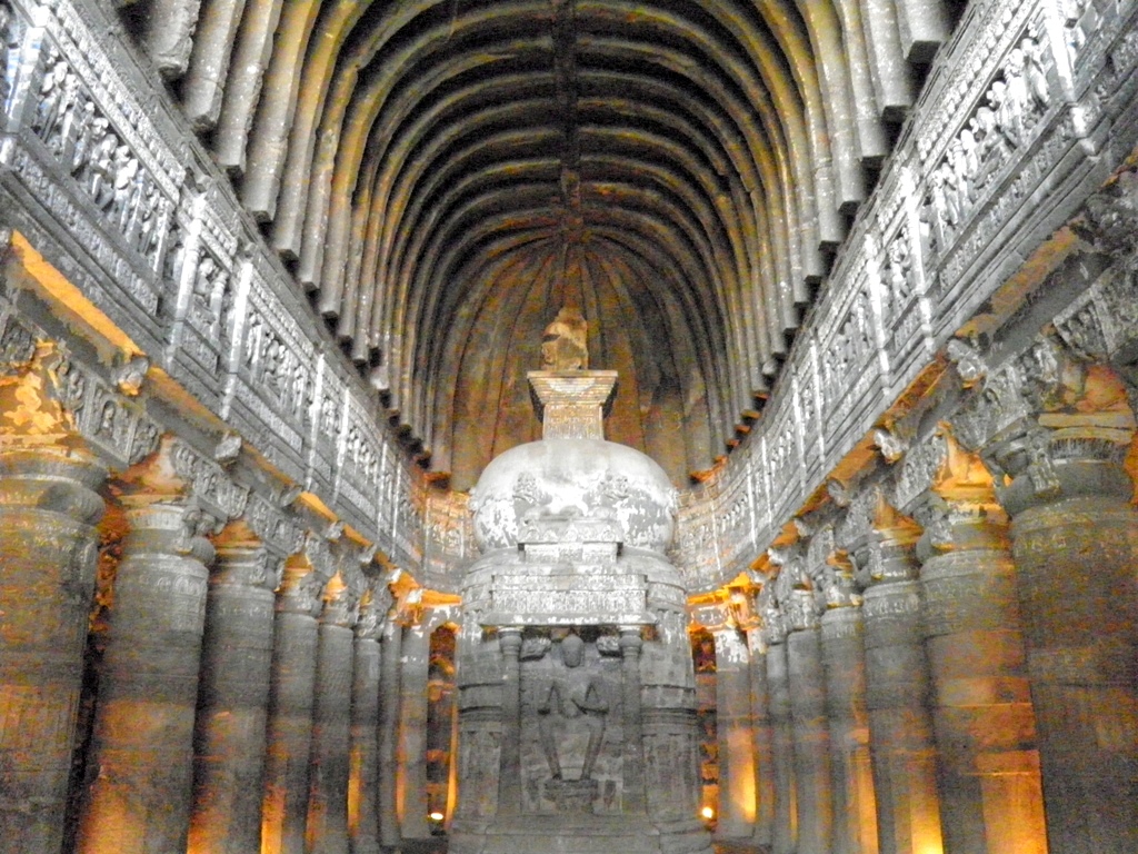 Interior prayer hall and carved stupa in Ajanta Cave 26
