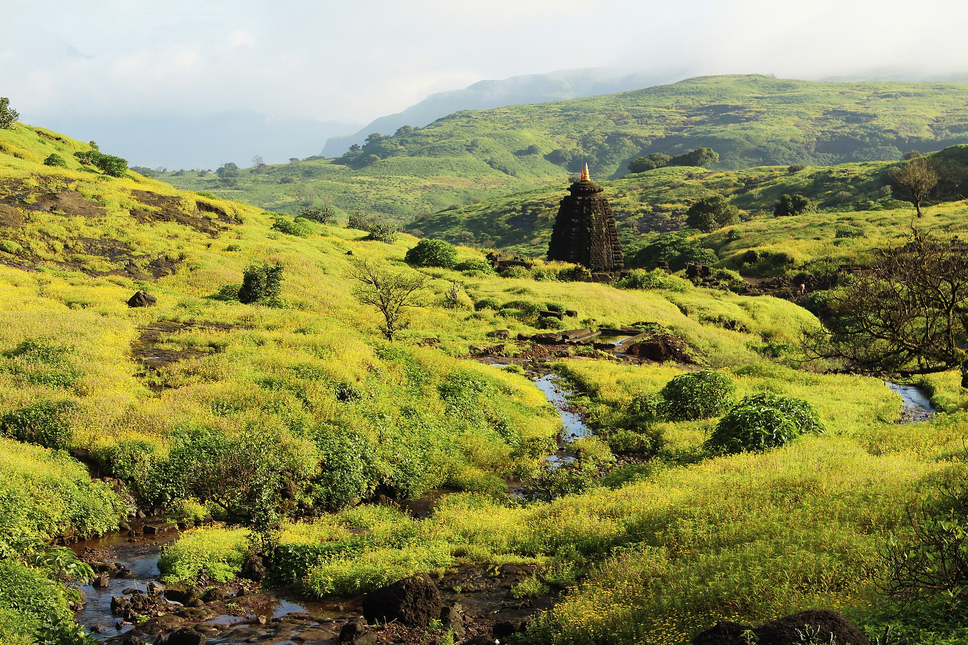 Harishchandreshwar Temple seen from the caves at Harishchandragad